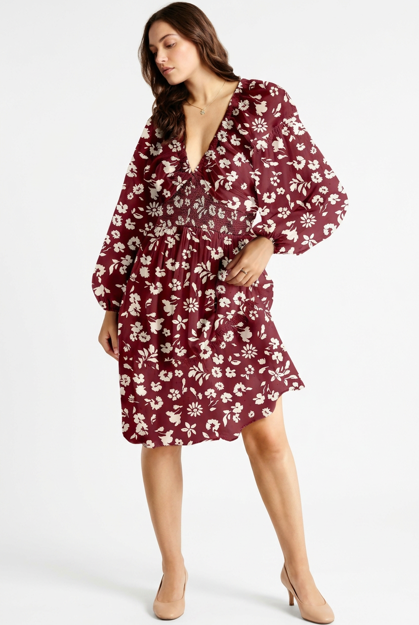 Burgundy and white floral V-neck mini dress with long sleeves and smocked waist, full-body front angled view