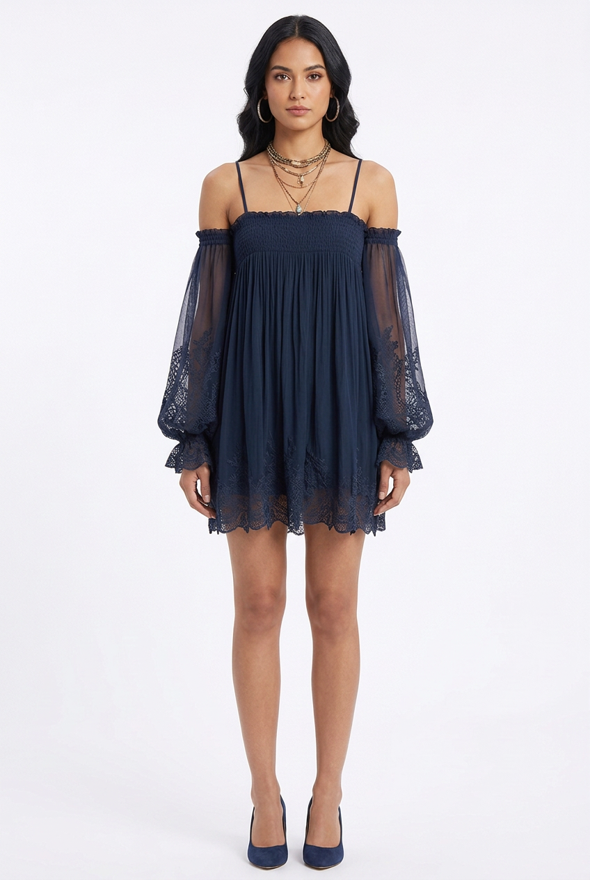 Blue gathered mini dress with scalloped lace hem and long sheer sleeves, full-body front view