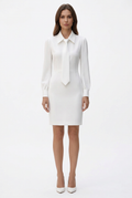 White collared tie-neck mini dress with long cuffed sleeves, full-body front view